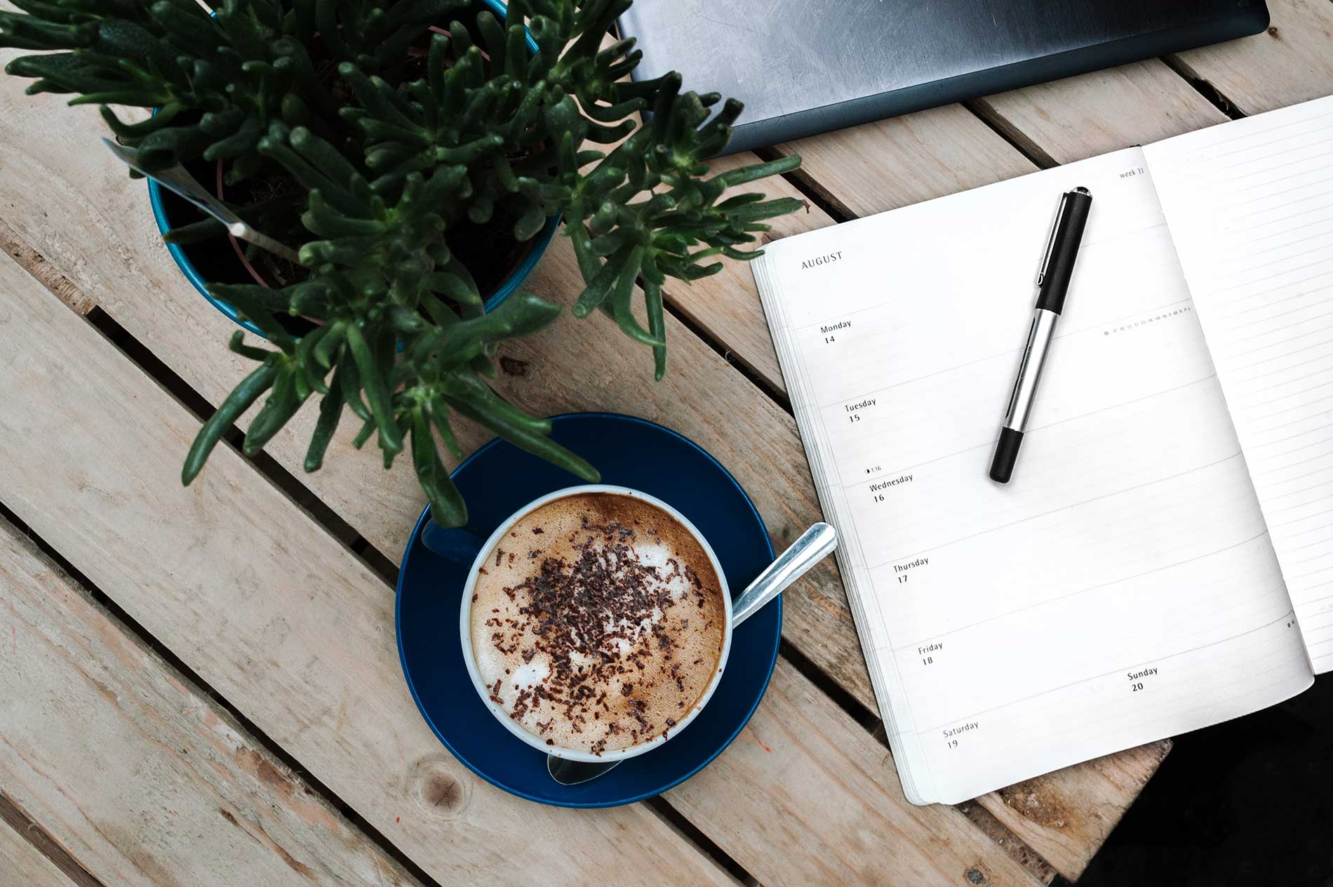 coffee cup and planner